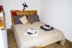 En eller flere senge i et værelse på La Casa di Marti