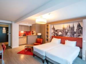 Postel nebo postele na pokoji v ubytování B&B HOME Caen Centre Gare