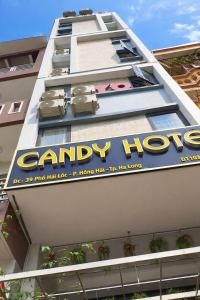 a large building with a sign on the side of it at Candy Hotel Hạ Long in Ha Long