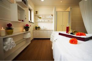 Postel nebo postele na pokoji v ubytování Wellness hotel Spark