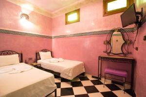 Letto o letti in una camera di Riad Saad