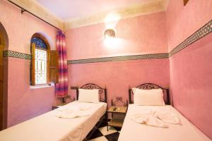Letto o letti in una camera di Riad Saad