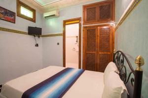 Letto o letti in una camera di Riad Saad