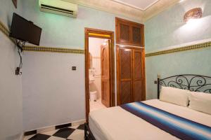 Letto o letti in una camera di Riad Saad