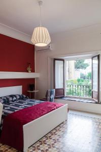 Ένα ή περισσότερα κρεβάτια σε δωμάτιο στο Casa Diaz