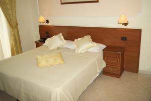Postelja oz. postelje v sobi nastanitve Hotel Elio