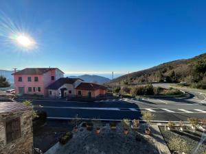 a view of a street with houses and a road at Casa Marcone in Deiva Marina