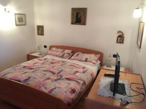 Giường trong phòng chung tại A Casa di Rita