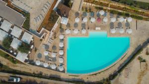 an overhead view of a pool at a resort at Basiliani - CDSHotels in Otranto