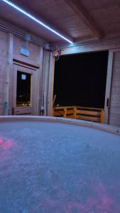 a large pool of water in a room at Dimora del Serva in Belluno