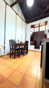 a dining room with a table and some chairs at Caleton-Gara-Suites in Garachico