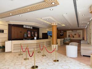 a lobby with red ribbonbons on the floor of a hospital at اكارم - إشبيلية - Akarem - iishbilia - اقتصادي in Riyadh