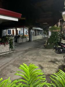 an empty parking lot in front of a gas station at Dreamstay Hostel in Moalboal