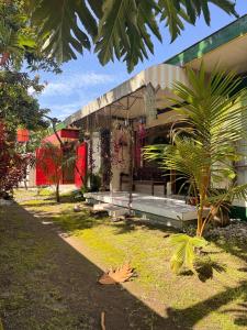 a building with a bench in front of it at Keselatan in Yogyakarta