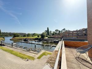 a view of a river with boats in it at Secret Spot Apartment - Quinta da Barca in Esposende