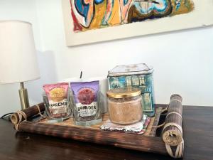 a tray with spices and other items on a table at Superb Guest Room in London