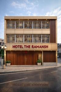a hotel the rammmann building on a street at Hotel R-A-M-A-N-S-H GRAND INN - Beside Ram Mandir Ayodhya 96,7000,2101 in Ayodhya
