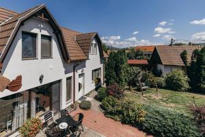 an aerial view of a house with a patio at Margareta Apartments in Odorheiu Secuiesc