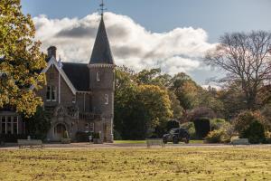 a truck parked in front of a large brick building at Ballathie House Hotel in Perth +62 photos
