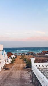a view of the ocean from a balcony at palma beach camp nuwibae in Nuweiba