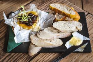 a plate of food with bread and a sandwich at Old Ship Aground in Minehead