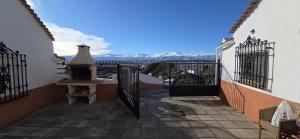 a view from the balcony of a house at Alojamiento La tinaja in Guadix +10 photos