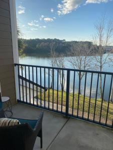 a balcony with a view of the water at Coastal Comfort in Jacksonville
