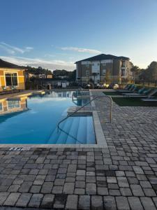 a pool of water with a building in the background at Coastal Comfort in Jacksonville