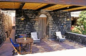 Patio alebo iná vonkajšia časť ubytovania I Dammusi di Punta Karace