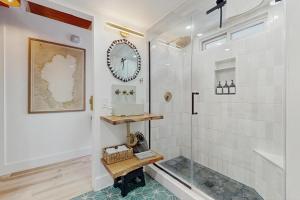 a bathroom with a shower and a sink at Elati Escape in South Lake Tahoe +13 photos