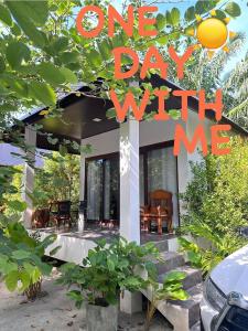 a one day with me sign in front of a house at Sweet Room by Maliblue Khanom in Ban Phang Phrao
