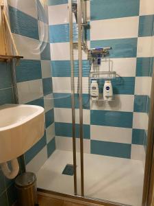a bathroom with a shower and a sink at Romantic stone farmhouse studios with private terrace in beautiful Tuscany in Subbiano +28 photos