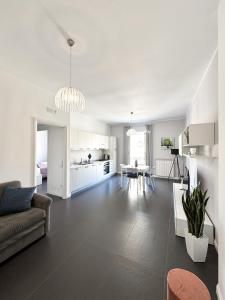 a living room with a couch and a table at The Superhost - Duomo Apt in Crotone