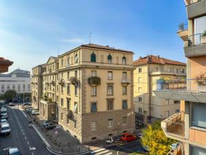 an apartment building in a city with a street at Charming Central Relais in Bergamo