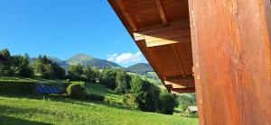 a house with a view of a mountain at Residence Rastbichl - Apartments & Indoor-Pool in Maranza