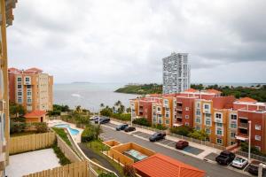 a view of a city with buildings and the ocean at Island Escape in Fajardo
