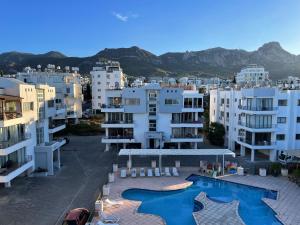 an aerial view of a city with white buildings at Rix Hostel Oda Kiralama, Ortak Banyo Mutfak in Kyrenia