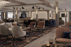 a rendering of a hotel lobby with chairs and a bar at Five-Stars Deluxe River Kruz from Aswan to Luxor 3 Nights in Aswān