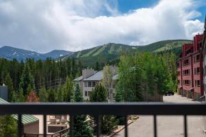 a view from a balcony of a town with mountains at Crestview Place Unit 607 in Winter Park +24 photos