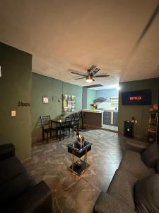 a living room with a couch and a table at Departamento Mateos 501 in Ciudad Acuña