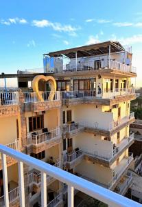 a building with balconies on the top of a building at Thebes Hotel in Luxor