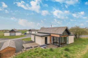 an image of a house with a driveway at 3 Bed in Bamburgh oc-w31886 in Bamburgh