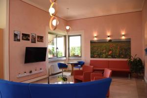 TV a/nebo společenská místnost v ubytování Hotel d'Altavilla