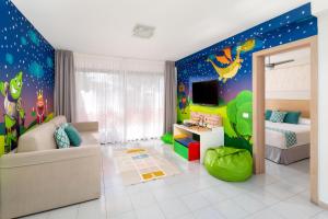 a childrens bedroom with a space themed room at Tagoro Family & Fun Costa Adeje in Adeje