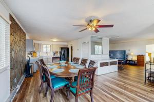 a kitchen and dining room with a table and chairs at Live Laugh Lake - A in Rushville