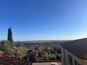 a view of the countryside from a house at Wine & View GUESTHOUSE in Soianella