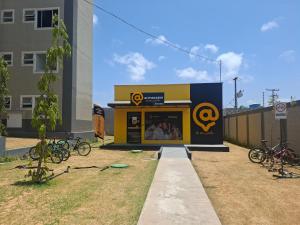 a store front of a building with bikes parked outside at AP a 3KM das PRAIAS, com SUÍTE in São Luís