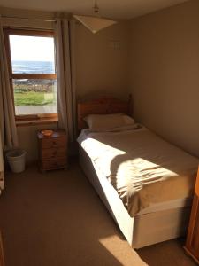 Llit o llits en una habitació de Seashore House