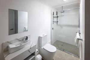 a bathroom with a toilet and a sink and a shower at 1 Duke street in Albany +61 photos
