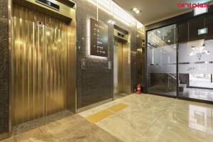 a lobby of a building with a fire hydrant at Jinju KAI Tourist Hotel in Jinju +21 photos